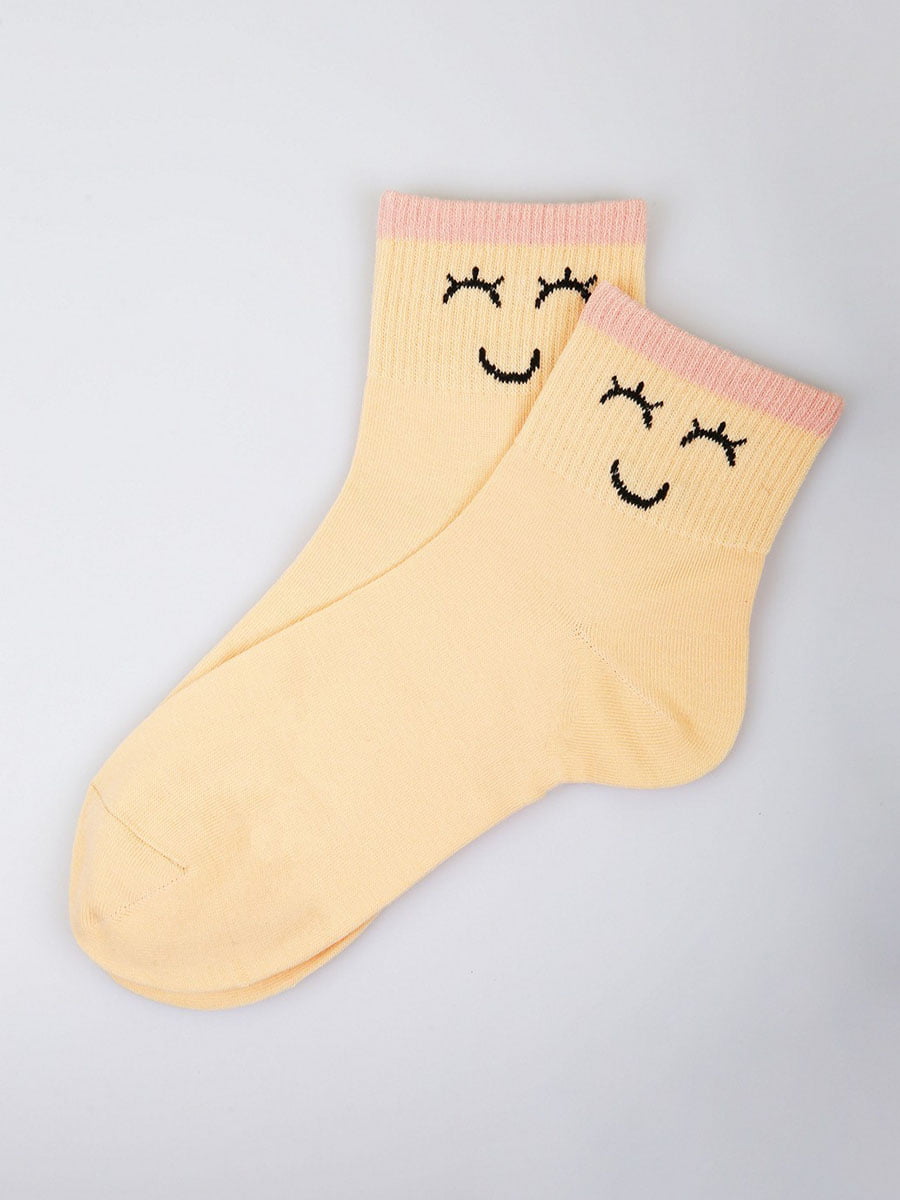 Шкарпетки персикового кольору з малюнком | 5928063