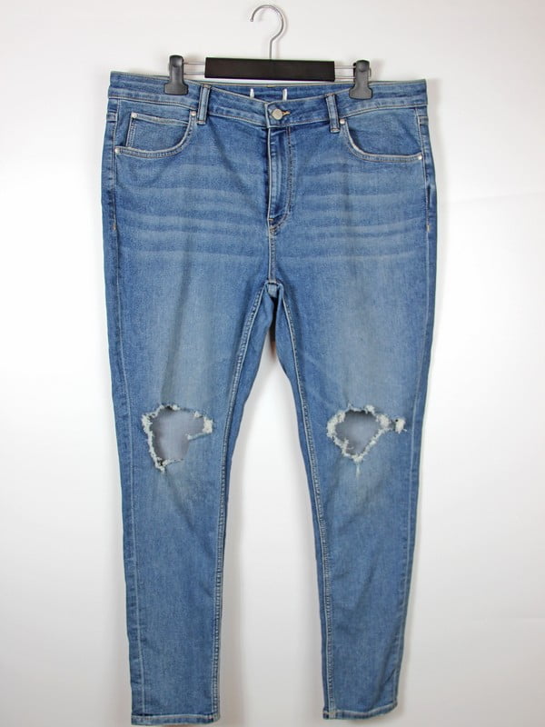 Завужені сині джинси з потертостями та дірками на колінах | 6507976