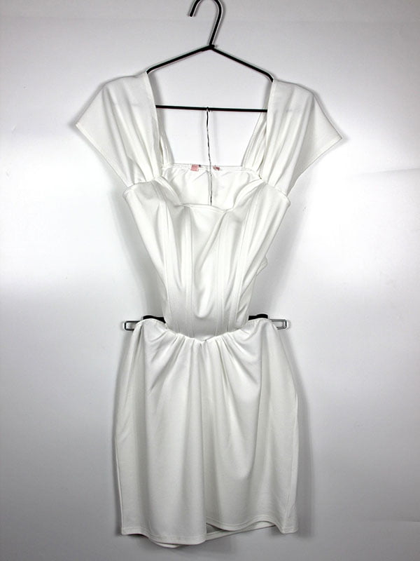 Біла сукня з глибоким вирізом | 6790473