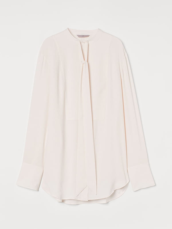 Подовжена асиметрична блуза кремового кольору | 6811936