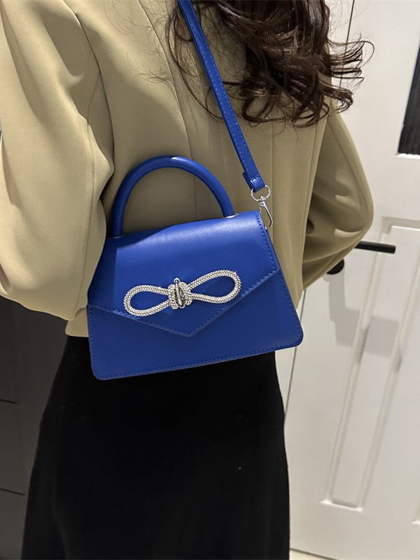 Синя сумка крос-боді зі сріблястим декором | 6875348