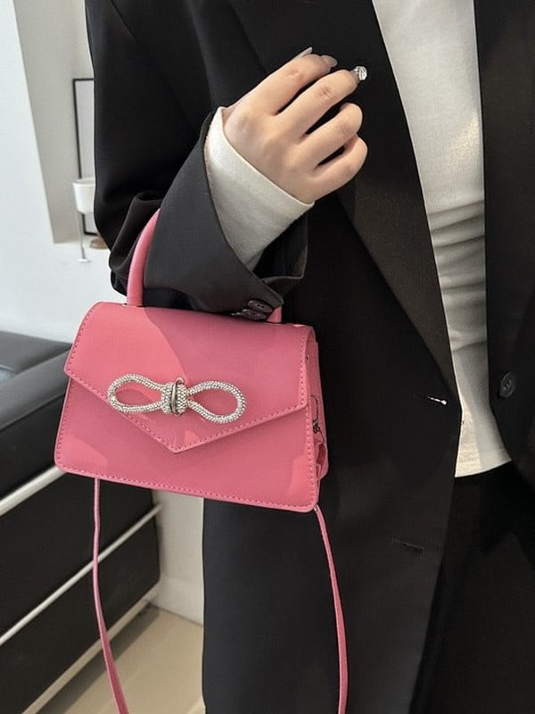 Рожева сумка крос-боді зі сріблястим декором | 6875349