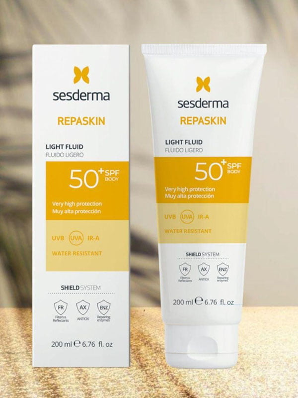 Сонцезахисний флюїд для тіла Repaskin Light Fluid Body Sunscreen SPF 50 (200 мл) | 7048521