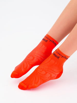 Шкарпетки оранжевого кольору з принтом | 6006253