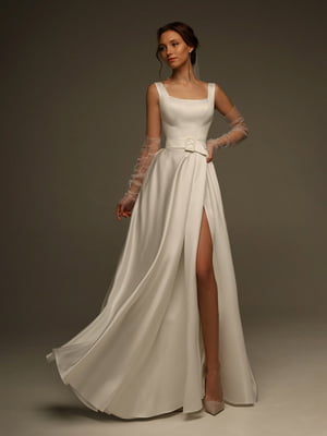 Атласна сукня молочного кольору з розрізом по нозі | 6506056