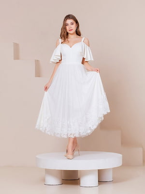Сукня молочного кольору з квітковим візерунком на фатиновій спідниці | 6506528