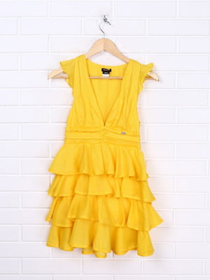 Сукня жовтого кольору, декорована рюшами | 6541777