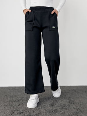 Трикотажные черные штаны на флисе с накладными карманами | 6547820