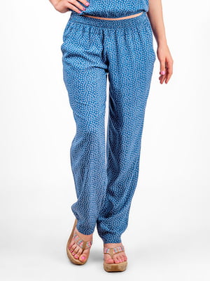Легкие брюки голубого цвета в цветочный принт | 6548573