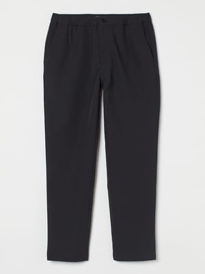 Черные брюки с диагональными боковыми карманами | 6527869