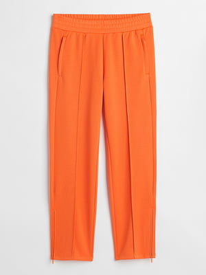 Оранжевые спортивные брюки с молниями по бокам | 6527889