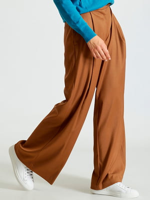 Расклешенные брюки коричневого цвета | 6568648