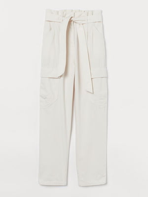 Свободные брюки молочного цвета с накладными карманами | 6584882