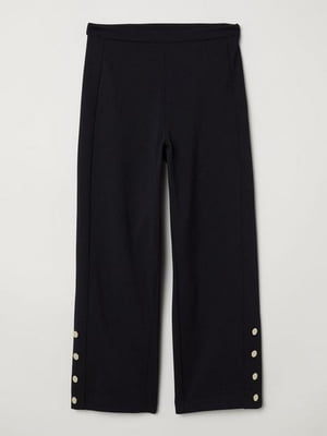 Широкие брюки черного цвета с пуговицами внизу штанин | 6585104