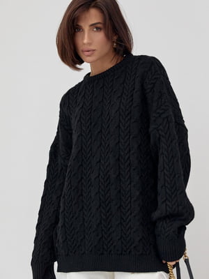 Вязаный свитер оверсайз черного цвета с узорами из косичек | 6615909