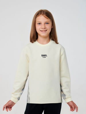 Свитшот кремового цвета с вставками ткани в стильную клетку и наклейкой Smil kids | 6618575