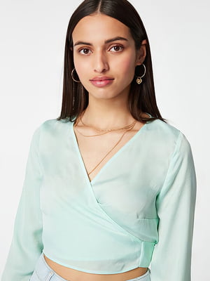 Блуза бірюзового кольору із зав'язками на спині | 6630401