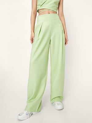 Расклешенные брюки зеленые | 6631497