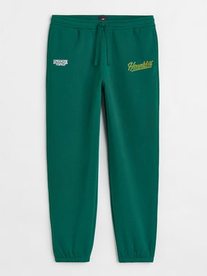 Спортивные зеленые брюки с надписью | 6632427