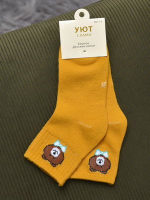 Шкарпетки жовтого кольору | 6685880