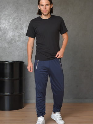 Спортивные штаны темно-синего цвета с полосками по бокам | 6686774