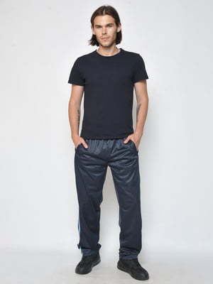 Спортивные штаны темно-синего цвета с контрастными полосками | 6686798