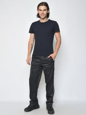 Спортивные штаны черного цвета с контрастными полосками | 6686799