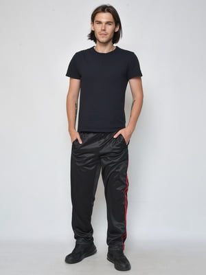 Спортивні штани чорного кольору з контрастними смужками | 6686802