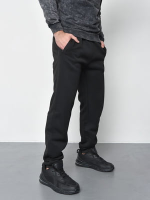 Спортивні штани на флісі чорного кольору. | 6686806