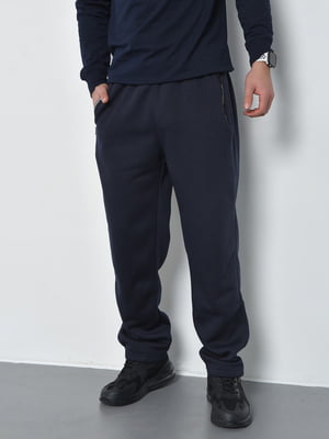 Спортивные штаны на флисе темно-синего цвета | 6686813