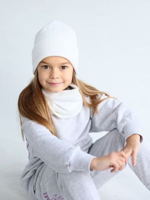 Комплект молочного кольору: шапка і шарф-хомут | 6701251