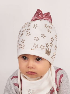 Комплект молочного кольору: шапка з зав’язками і шарф-хомут | 6701464