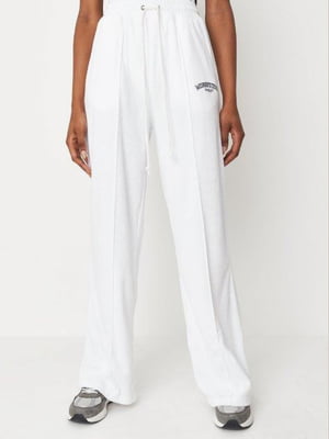 Вільні білі штани з фірмовою вишивкою та кишенями | 6707347