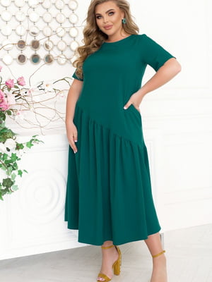 Елегантна зелена сукня А-силуету з асиметрично підшитим подолом | 6721797