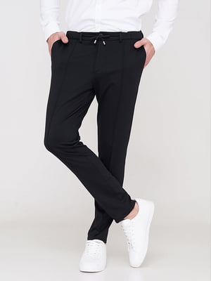 Повседневные черные брюки с карманами | 6727130