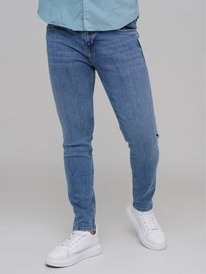 Сині обтягуючі джинси | 6727424