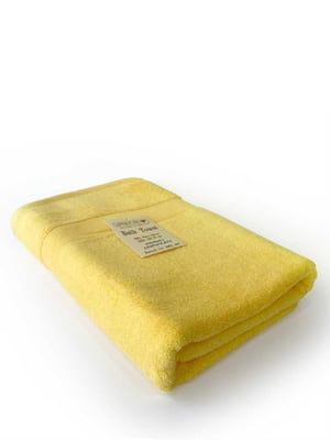 Махровий рушник жовтого кольору у подарунковому пакеті (70 х 140 см) | 6730839