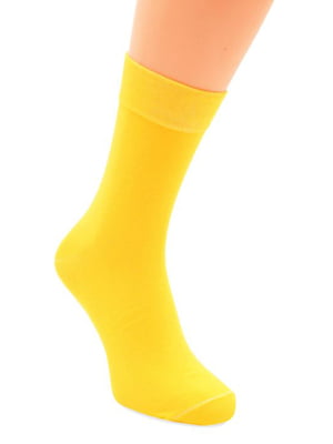 Високі шкарпетки жовтого кольору | 6737901