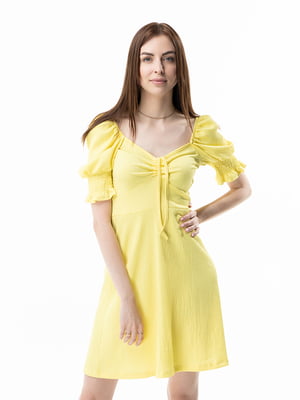 Жовта спідниця А-силуету з фігурним вирізом | 6747089
