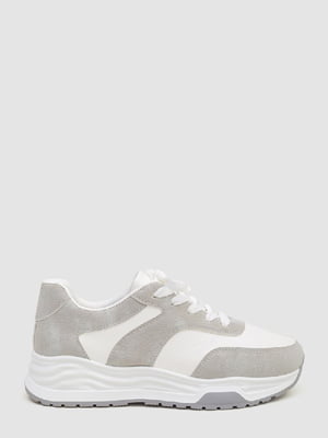 Бело-серые кроссовки на белой подошве | 6759364