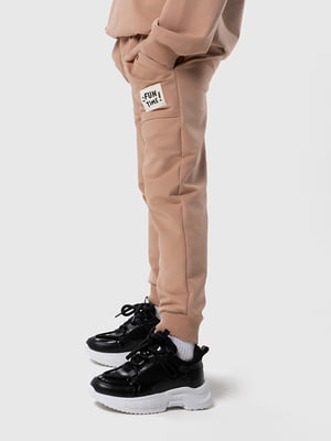 Бежеві спортивні штани-джогери з кишенями | 6749708