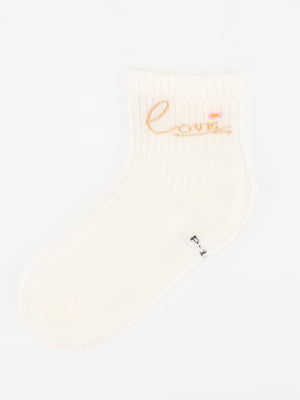 Шкарпетки молочного кольору з принтом | 6750257
