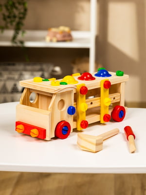 Іграшка дерев'яна "Стукотлива машина" | 6752752