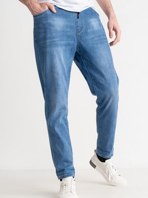Блакитні звужені джинси з потертостями | 6764158