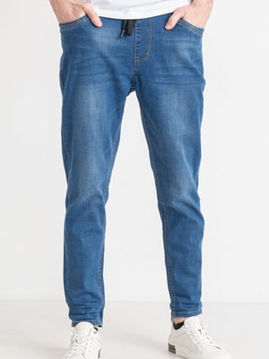 Блакитні звужені джинси з потертостями | 6764160