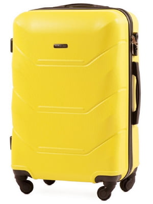 Середня жовта дорожня пластикова валіза на 4-х колесах (62 л) | 6766988