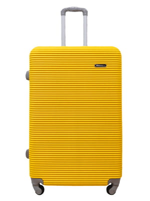 Велика пластикова валіза жовтого кольору на 4-х колесах | 6767525