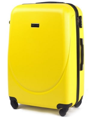 Велика пластикова валіза жовтого кольору на 4-х колесах | 6767657