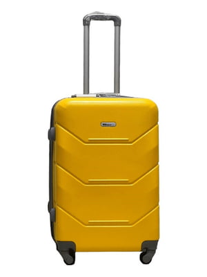 Пластикова валіза середнього розміру жовтого кольору на 4-х колесах | 6767761