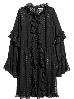 Чорна сукня в горох, прикрашена воланами | 6774569